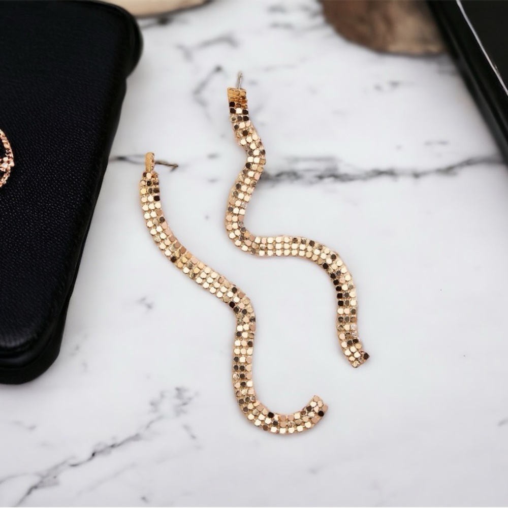 long gold tassel earrings